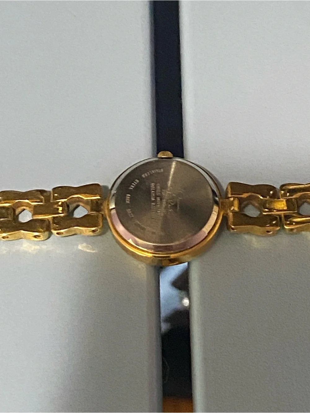 Decan De La Renta gold tone designer watch